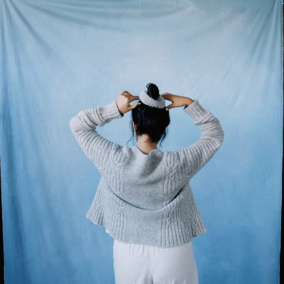 Cloudbusting - Cárdigan con trenzas
2