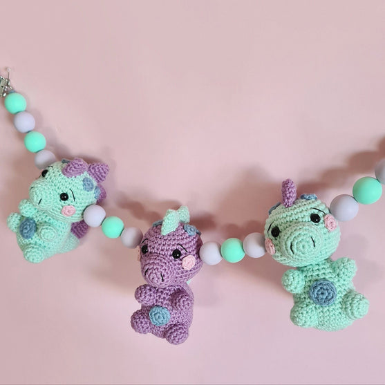 Cadena de cochecito Dino
2