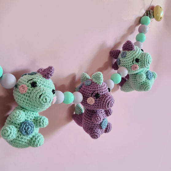 Cadena de cochecito Dino
3