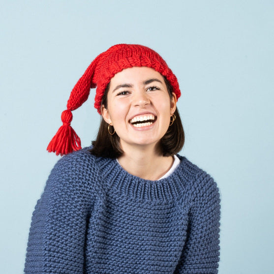 Chris - Gorro navideño
5