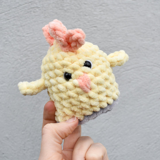 Conejito y Pollito - Juguete reversible
9