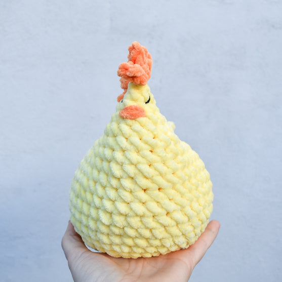 Henny - Gallina con huevos
6
