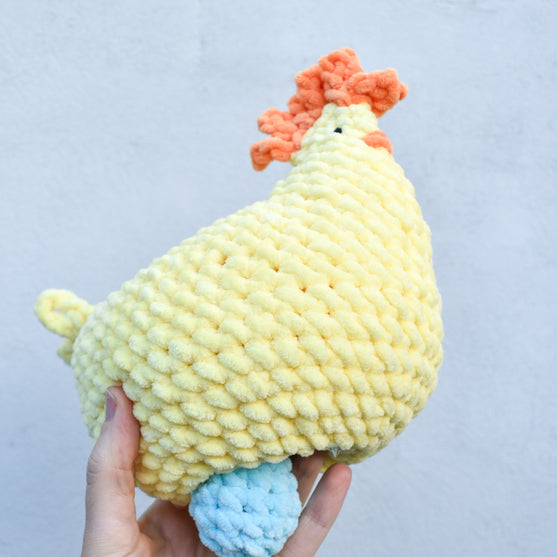 Henny - Gallina con huevos
3
