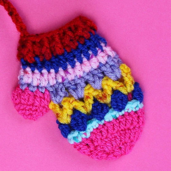 Mini Mitten - Sujeta Servilletas
3