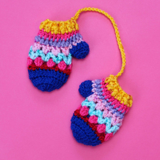 Mini Mitten - Sujeta Servilletas
4