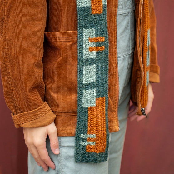 Rust & Rhythm - Bufanda con capucha
4