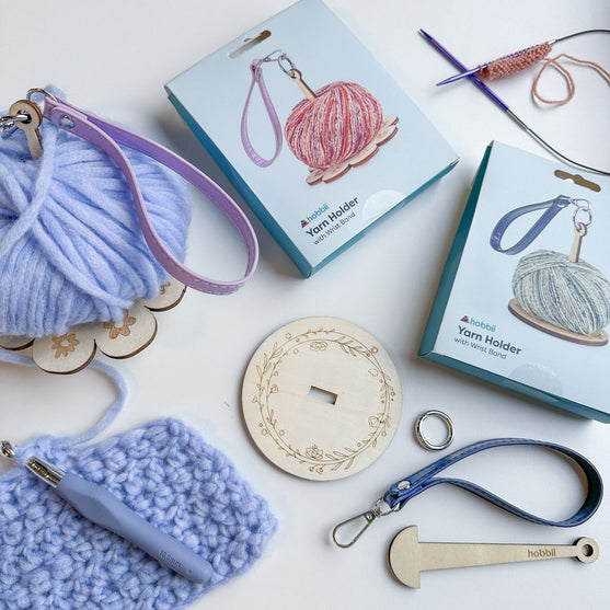 Porta hilo de muñeca - Hobbii
4