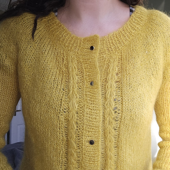 

Feather - Cárdigan
4