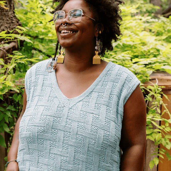 

Calme Top - Top sin mangas en trenza de cesta
4