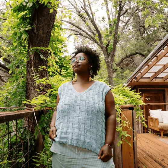 

Calme Top - Top sin mangas en trenza de cesta
5