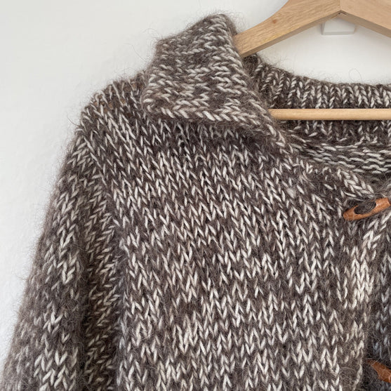 

Cortado - Cárdigan
6