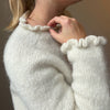 

Easy Ruffle Sweater
1
