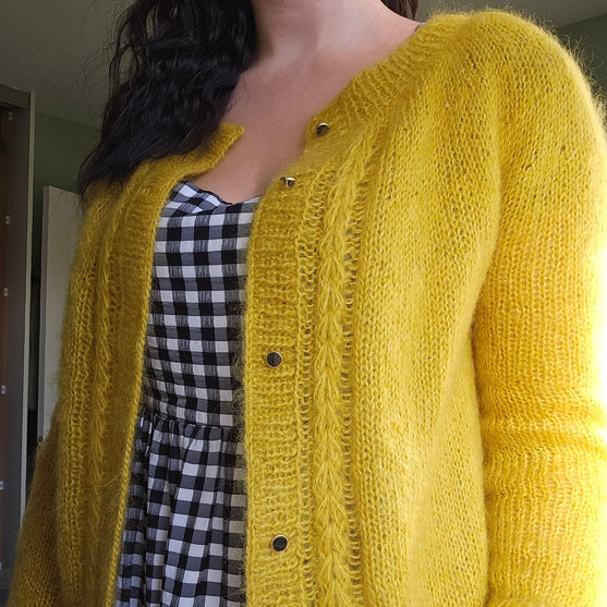 

Feather - Cárdigan
3