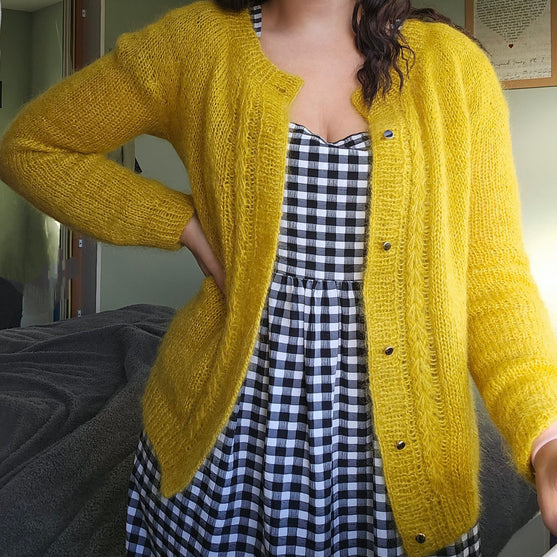 

Feather - Cárdigan
2