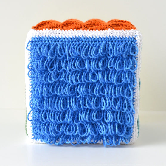 

Sensory Cube - Juguete
5